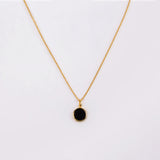 DIJE CLEO ÓNIX + COLLAR BAÑO DE ORO