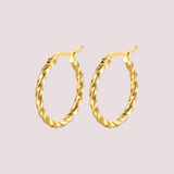 Argollas Twist Waterpoof en Oro de 18k